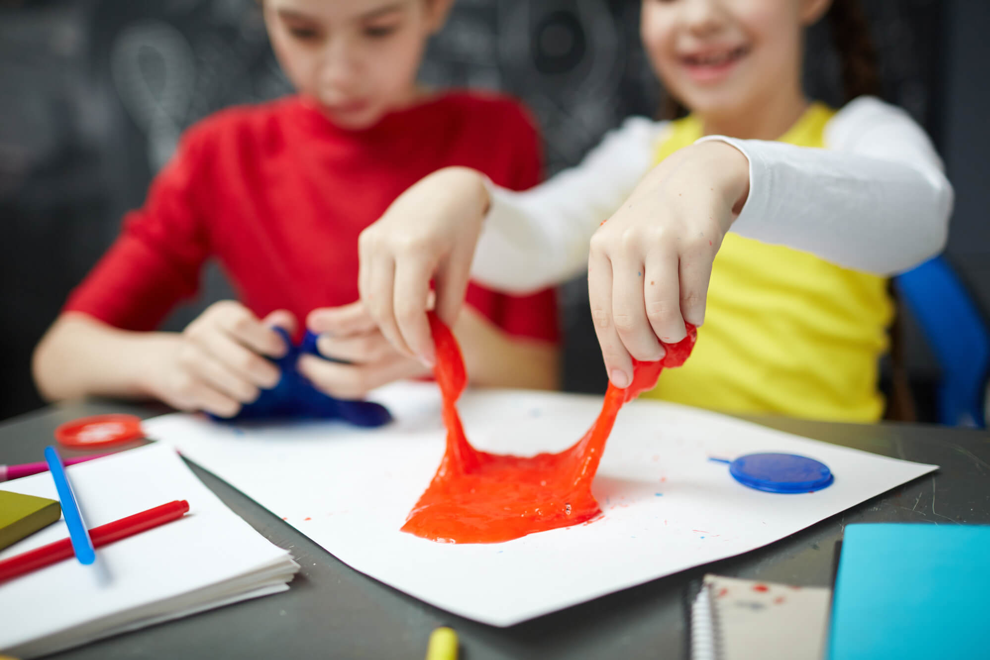 kids playing with slime in an educational birthday party in Woodbury CT